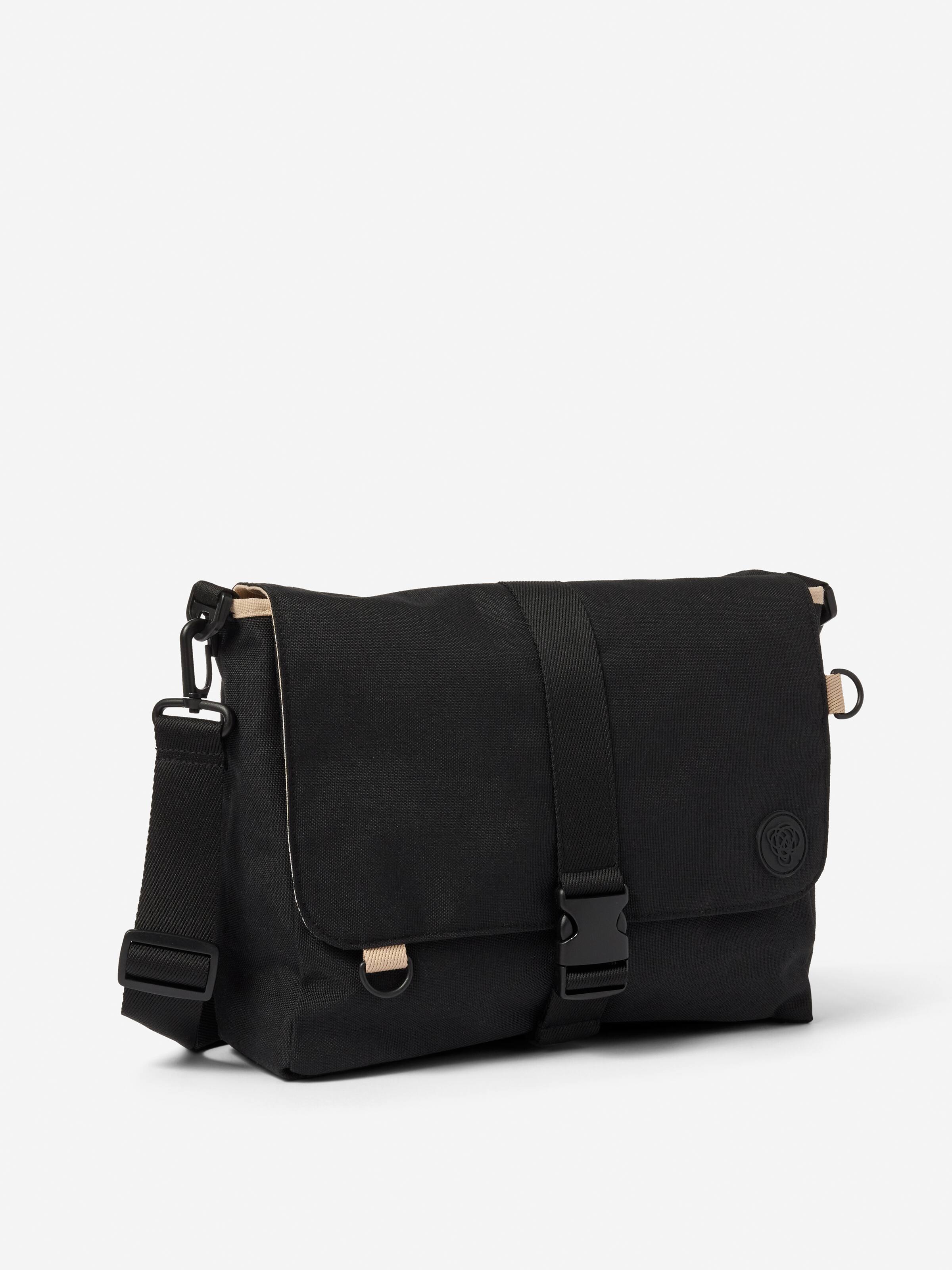 Tobi Reversible Messenger Bag